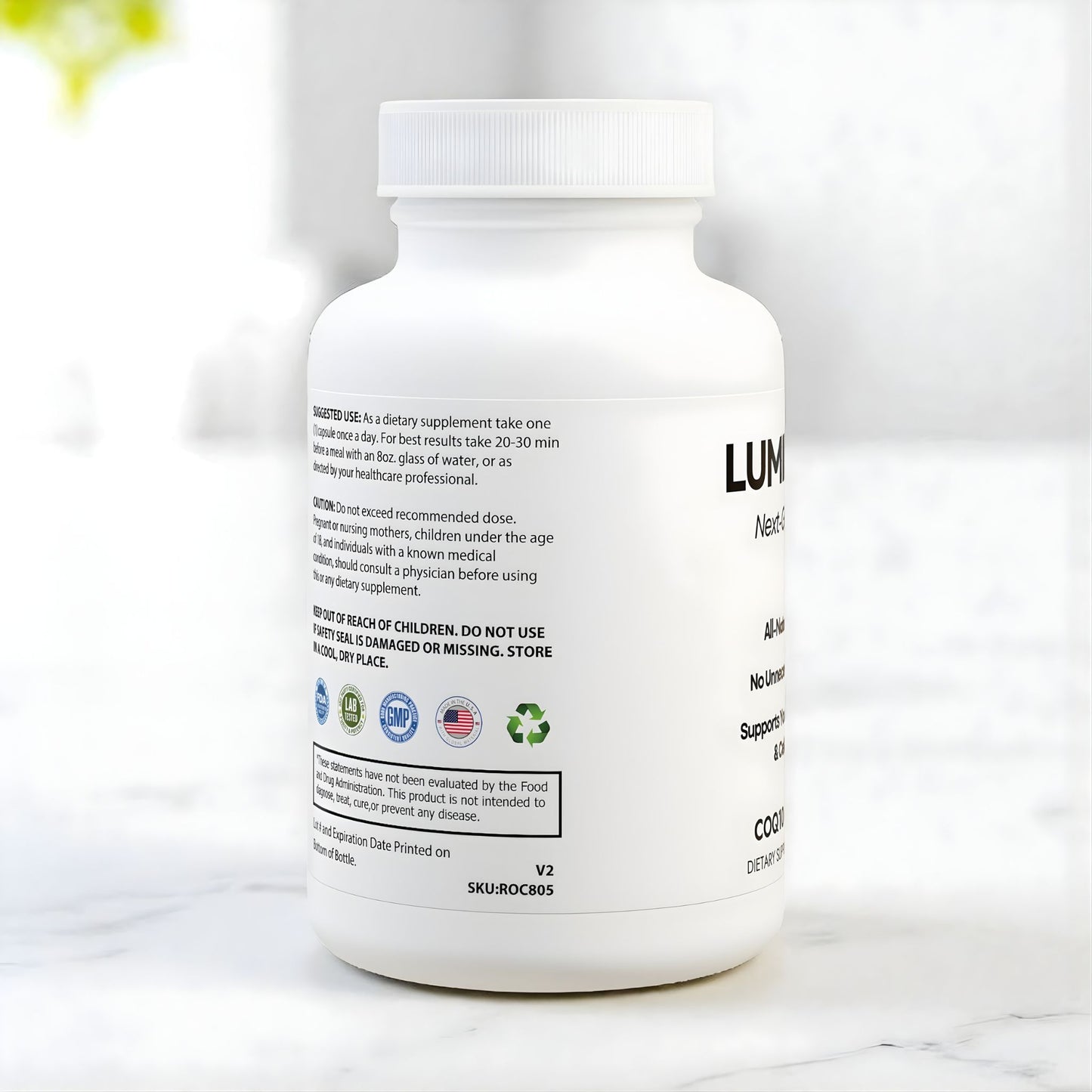 Co Enzyme Q10 skincare supplement, standing on a modern marble table.