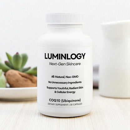 Luminology COQ10 anti-aging supplement bottle on a light surface with a blurred background.