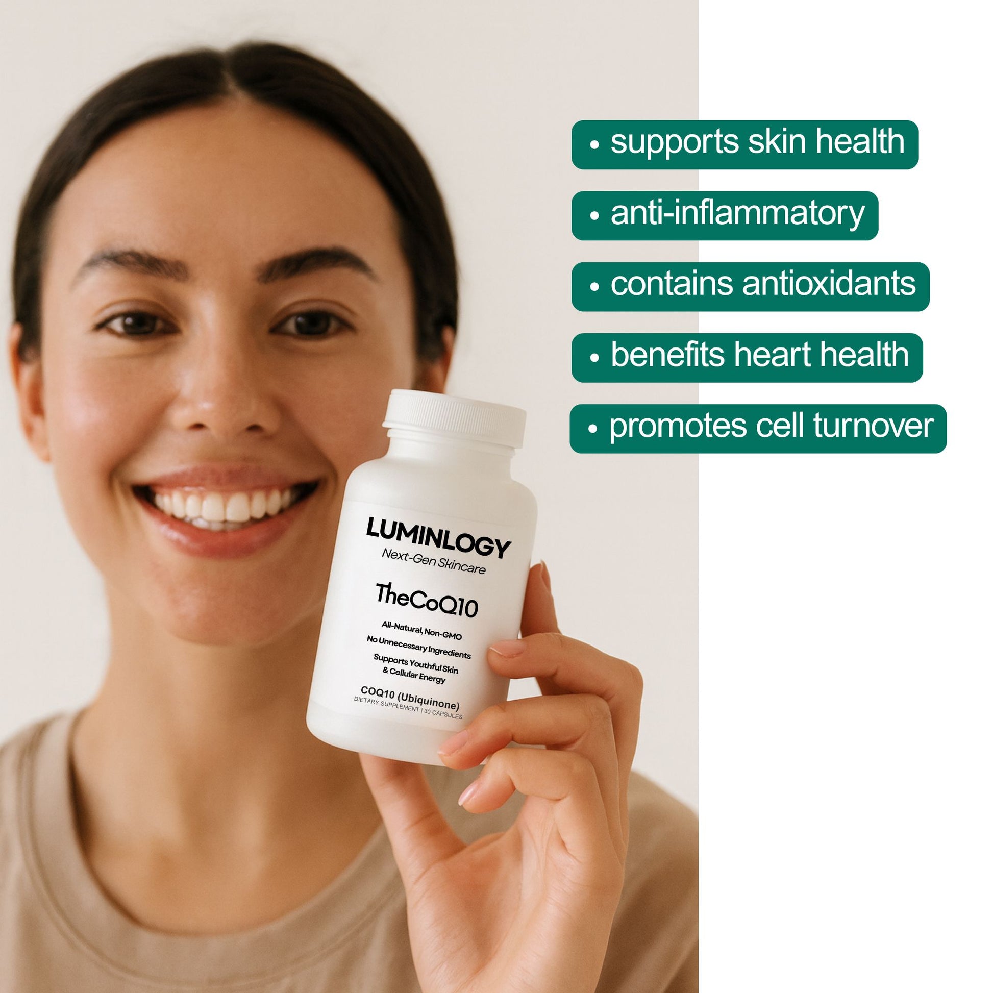 Woman smiling while holding a CoQ10 supplement bottle with it's skin, heart, cellular, and anti-inflammatory, health benefits listed. 