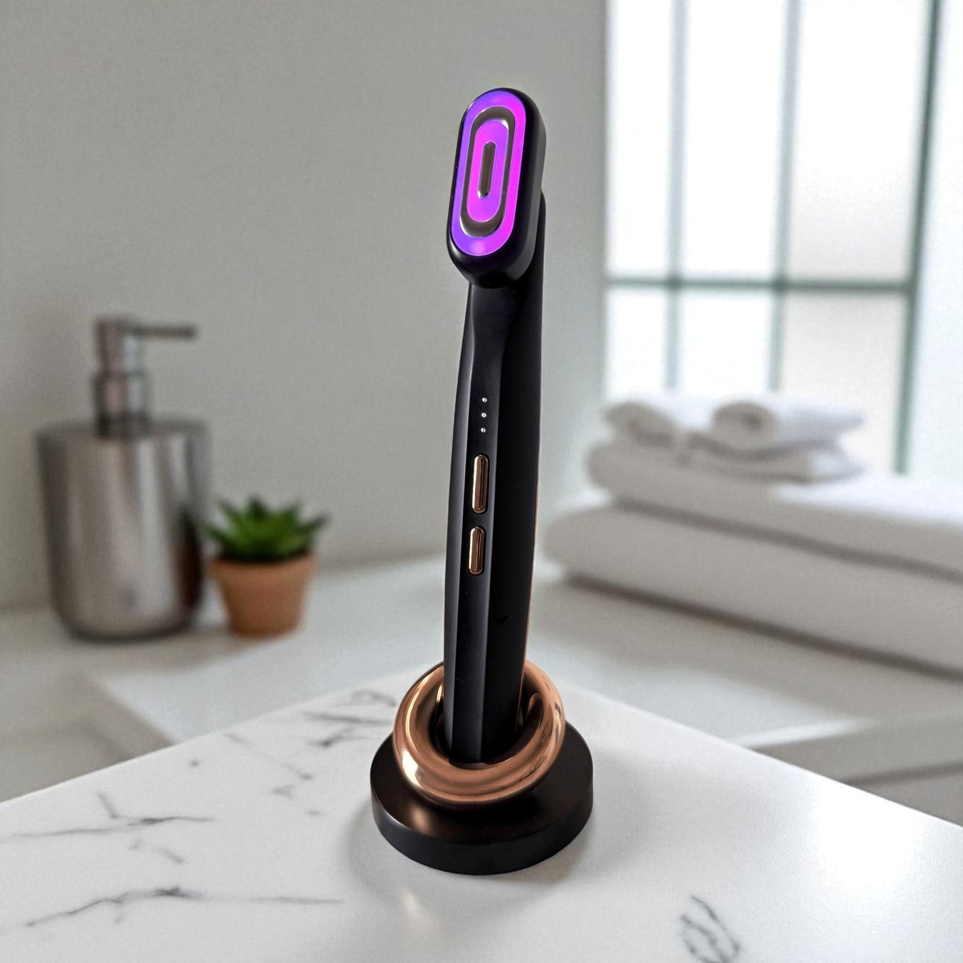 Purple light therapy device on a marble surface with a blurred bathroom background.