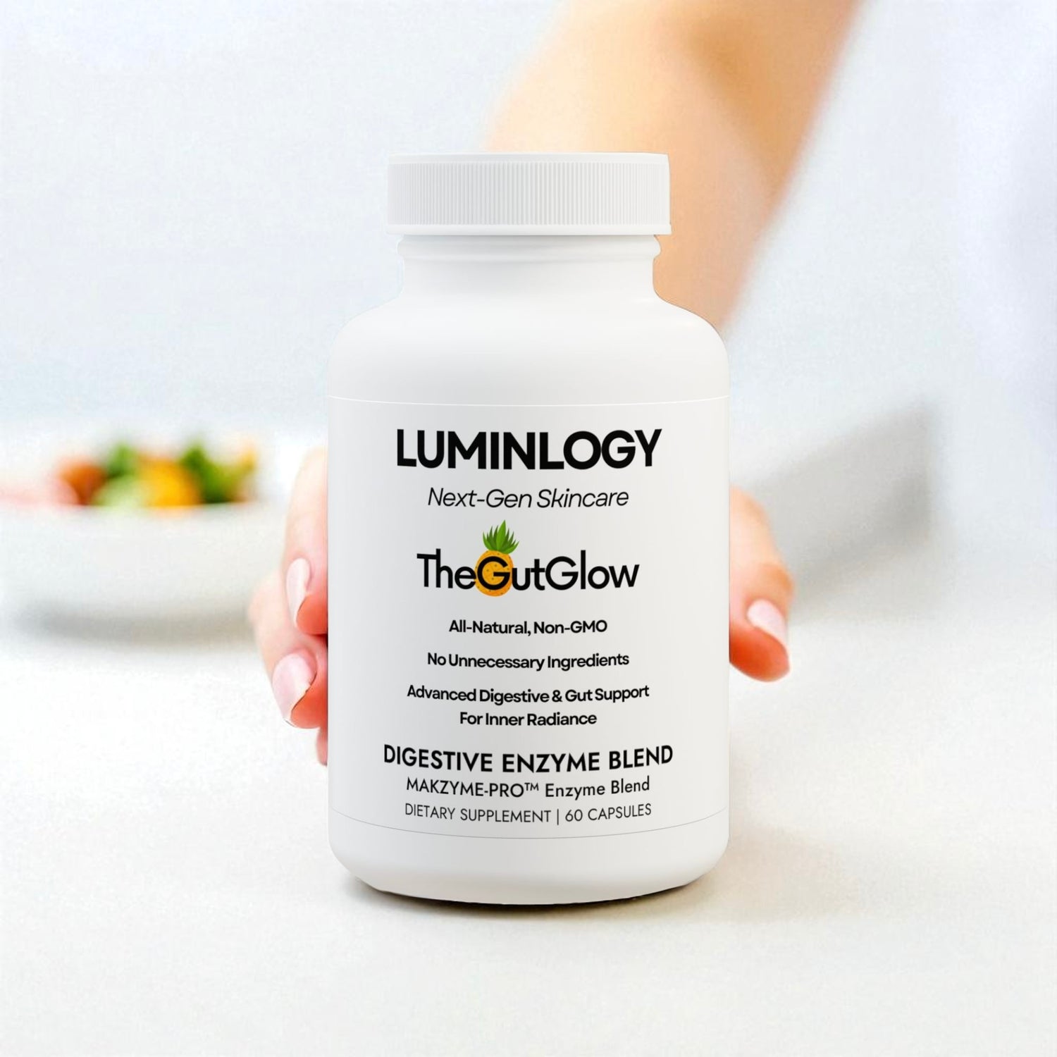 A woman reaching for the Luminology digestive bromelain skin supplement to eat it.