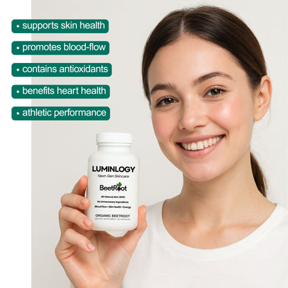 A woman smiling holding a Luminology organic beetroot supplement bottle with product benefits listed, skin health, blood-flow, and athletic performance. 